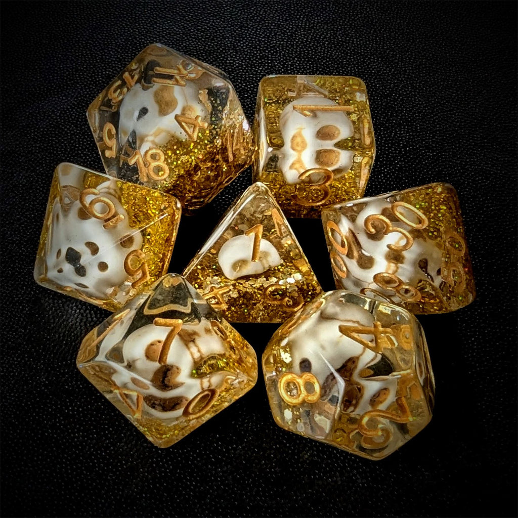 Skull & Gold Glitter in Clear Resin - 7pcs RPG Full Dice Set