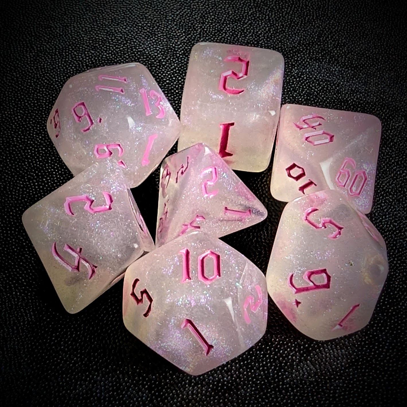 Glitter in White Acrylic with Pink Font - 7pcs RPG Full Dice Set