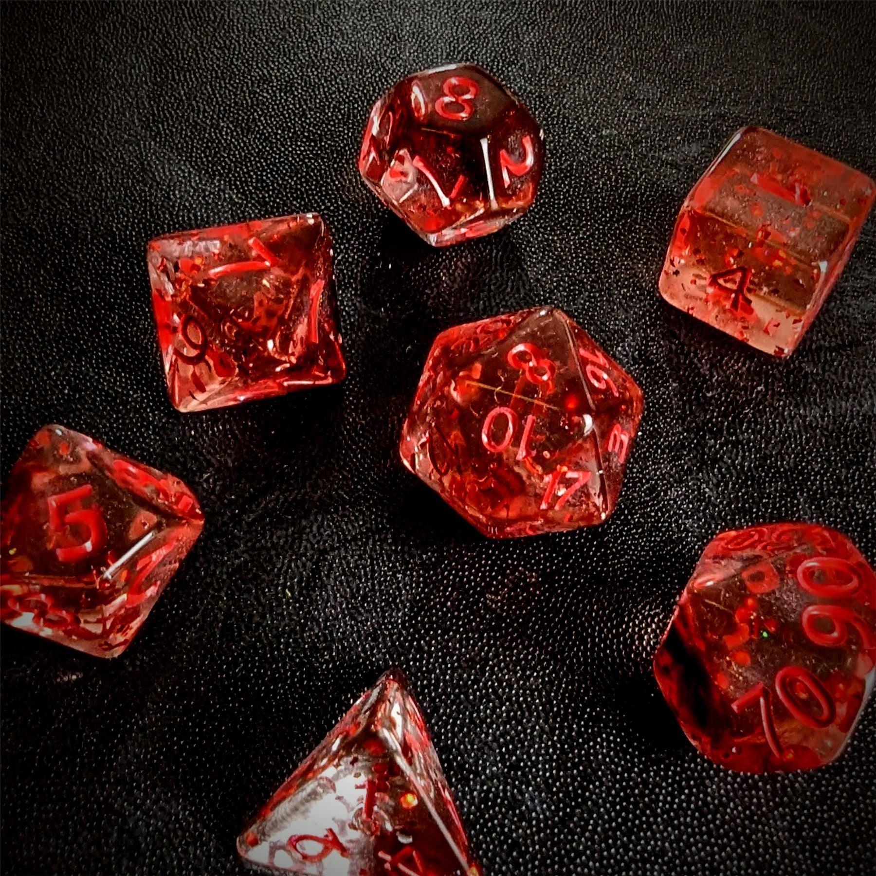 Glitter in Clear Red Acrylic - 7pcs RPG Full Dice Set