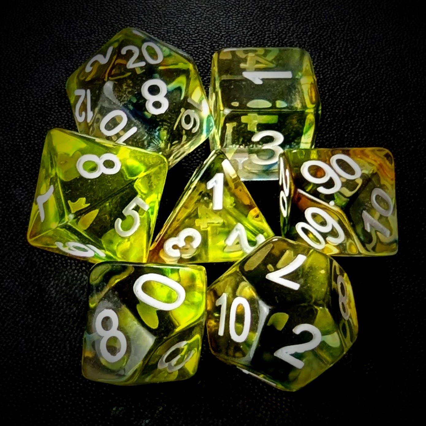 Yellow & Black with Blue Swirl in Clear Resin - 7pcs RPG Full Dice Set