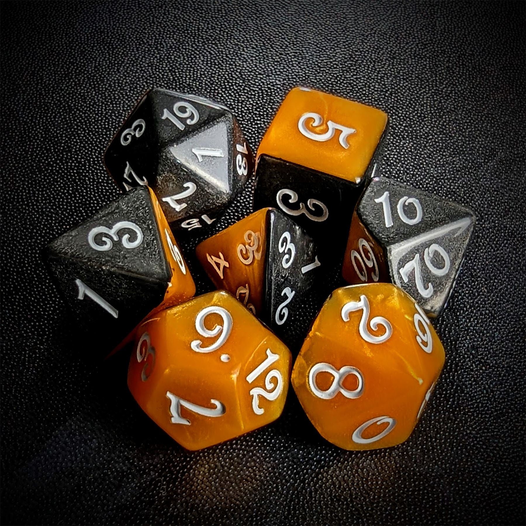 Blend of Black & Orange Acrylic - 7pcs RPG Full Dice Set
