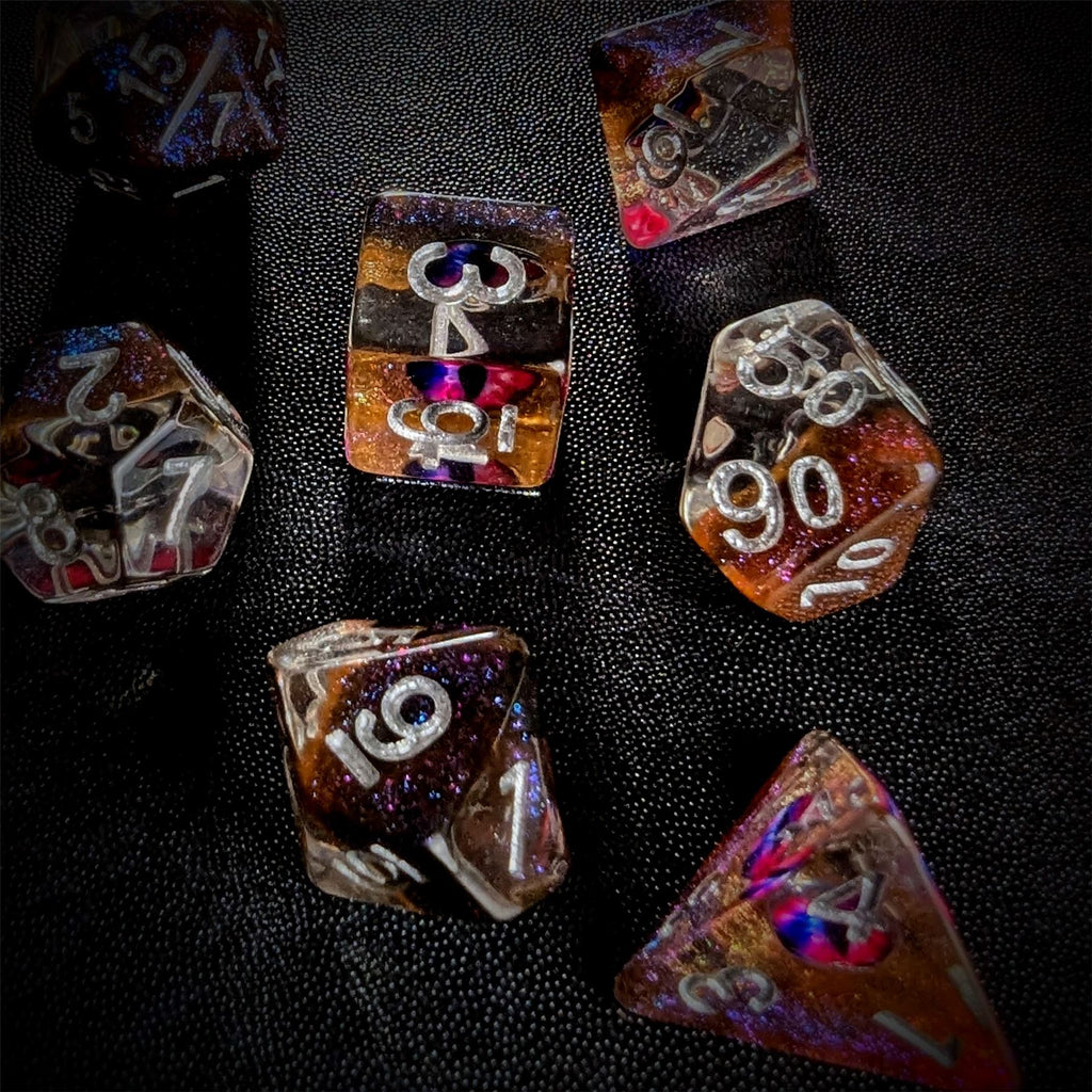 Demon Eye in Clear & Orange & Blue Resin - 7pcs RPG Full Dice Set