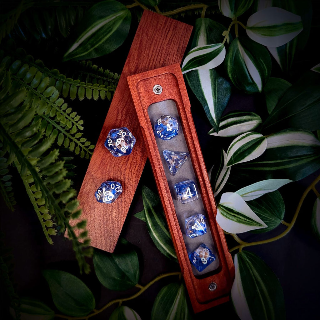 Skull & Gold Foil in Clear & Blue Resin - 7pcs RPG Full Dice Set
