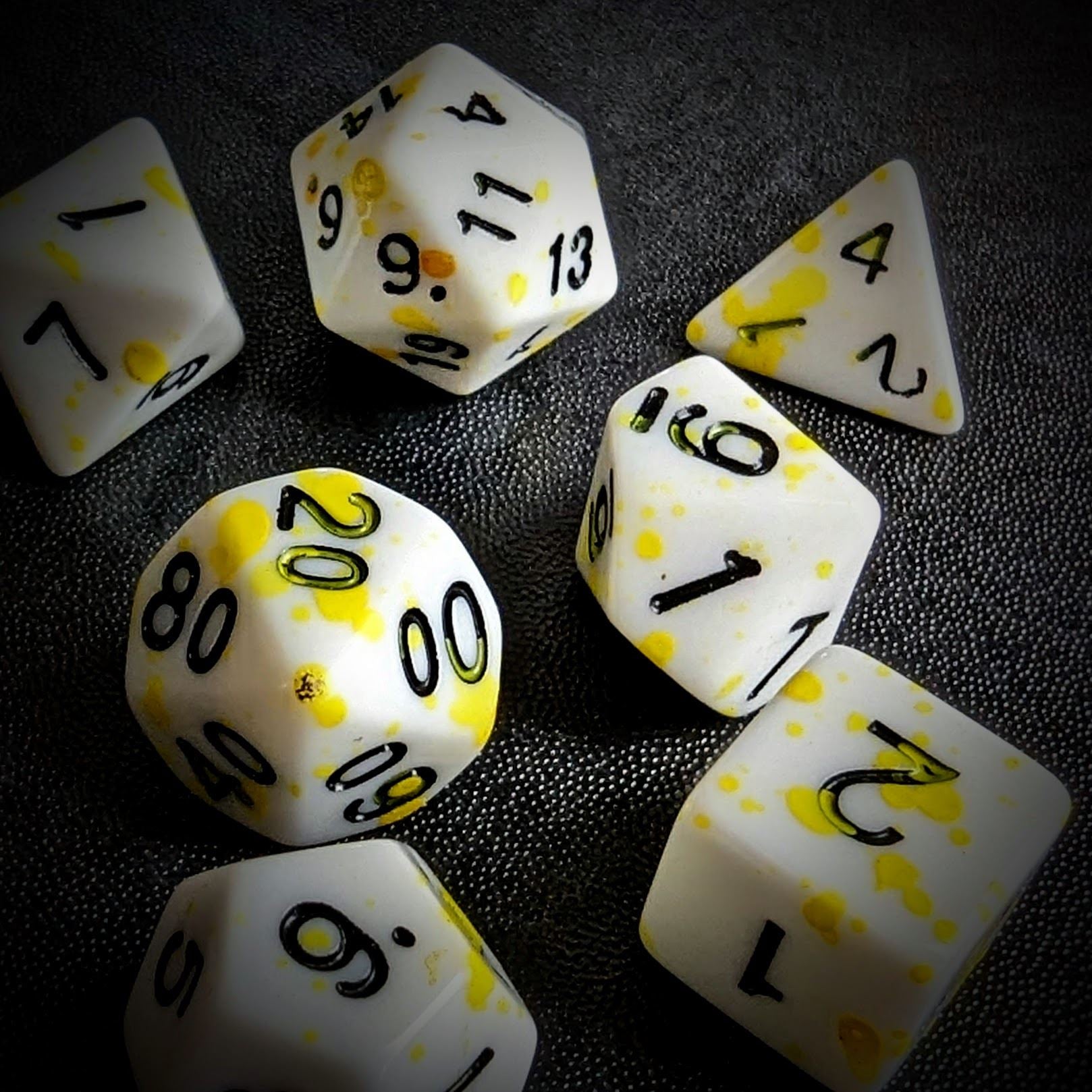Yellow Blood Splatter on White Acrylic - 7pcs RPG Full Dice Set