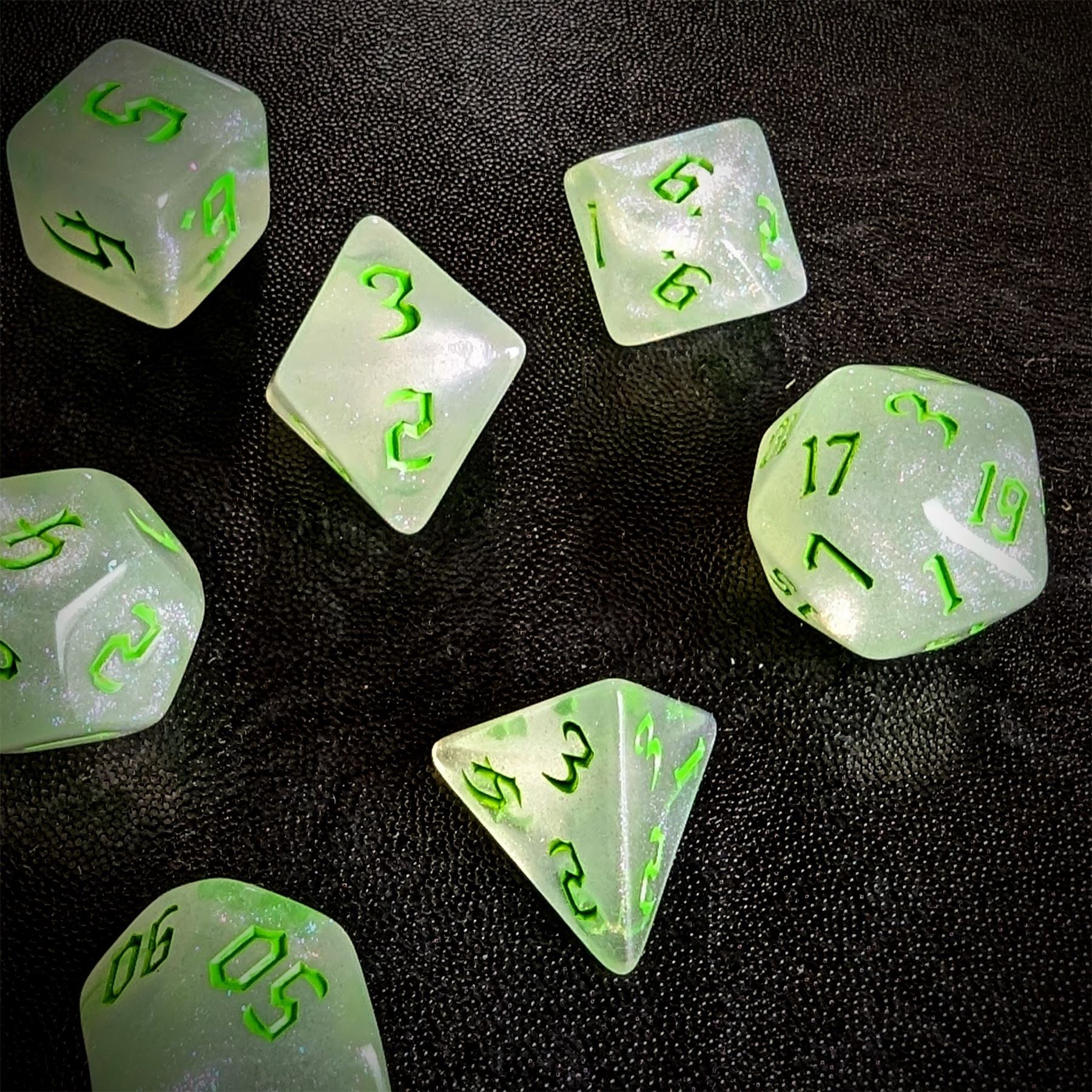 Glitter in White Acrylic with Green Font - 7pcs RPG Full Dice Set