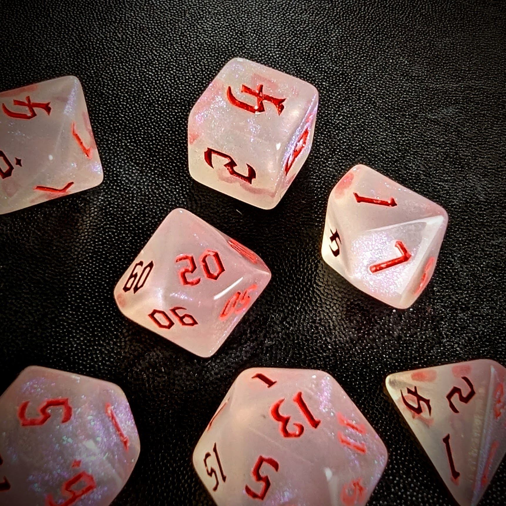 Glitter in White Acrylic with Red Font - 7pcs RPG Full Dice Set