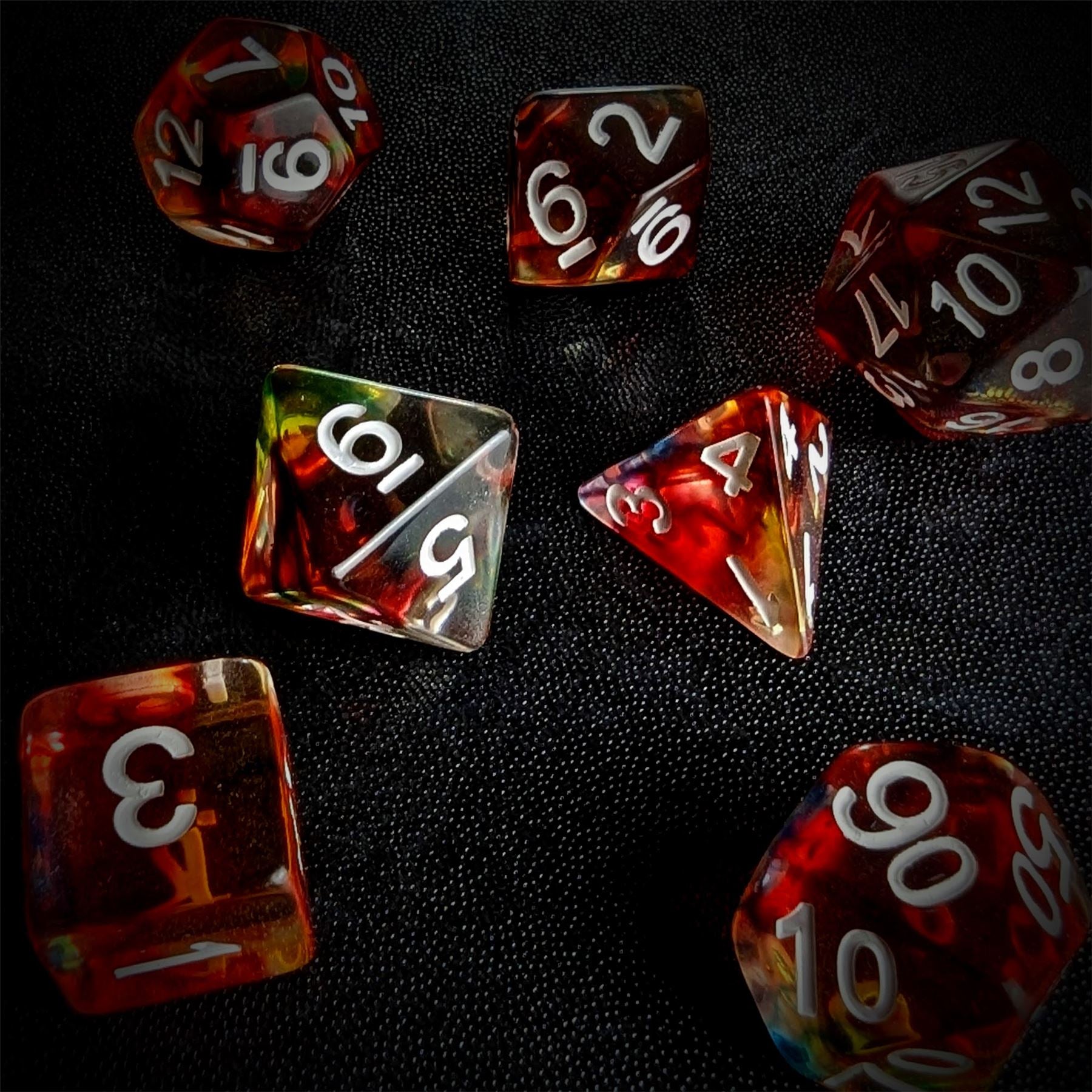 Red & Black with Blue Swirl in Clear Resin - 7pcs RPG Full Dice Set