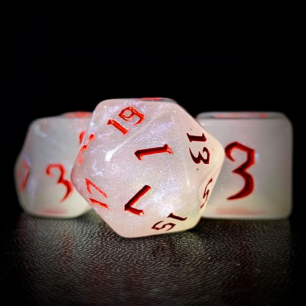 Glitter in White Acrylic with Red Font - 7pcs RPG Full Dice Set